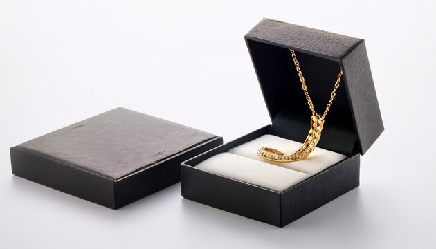 open jewelry box with gold necklace inside isolated on white background ideal for luxury branding and gift design