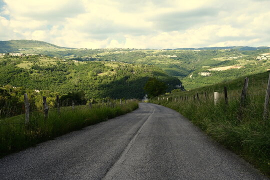 Road leading to the Veja Bridge: the stone giant of Lessinia.