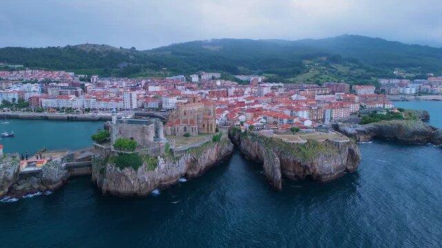 Aerial view from a drone of the Castro Urdiales port, the Church of Santa Mar&iacute;a, and the Santa Ana Castle Lighthouse. Castro Urdiales Municipality. Cantabrian Sea. Cantabria. Spain. Europe.