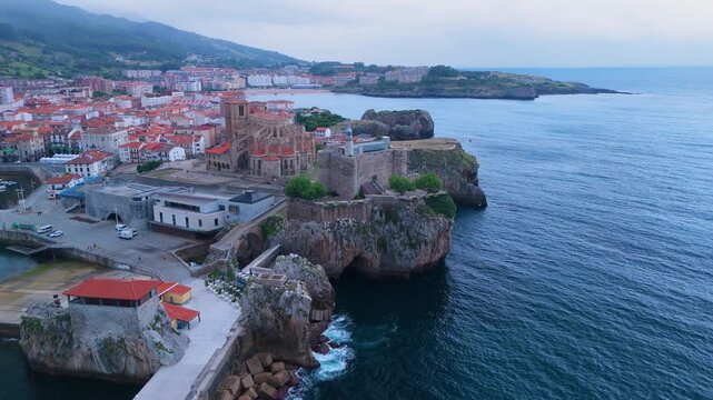 Aerial view from a drone of the Castro Urdiales port, the Church of Santa Mar&iacute;a, and the Santa Ana Castle Lighthouse. Castro Urdiales Municipality. Cantabrian Sea. Cantabria. Spain. Europe.