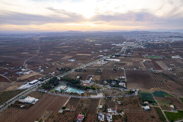 Obraz premium Aerial View of Sogutludere Recreation Area Park and Restaurant Complex Surrounded by Vast Olive Groves in Rural Kilis Landscape