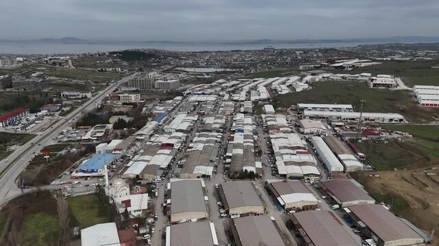 Industrial city landscape featuring factories, warehouses, industrial buildings, and infrastructure. The video represents manufacturing, industry, production, and economic development, suitable for bu