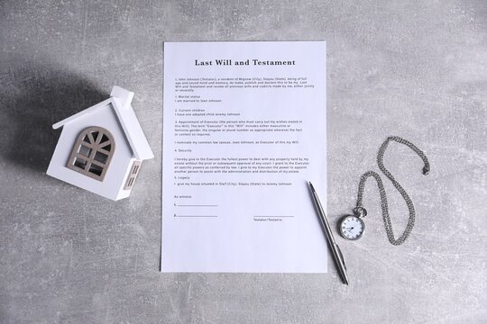Last Will and Testament, house model, pen and chain watch on grey background, flat lay