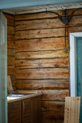 Fototapeta premium a wooden beam wall in the kitchen
