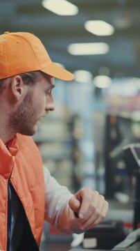 Operator handles checkout and stock, Night worker scans codes while overseeing inventory and checkout processes