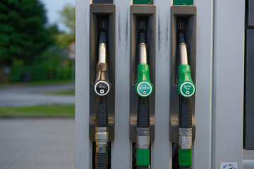 Danish Fuel pump hoses for diesel and gasoline grades at station. © Holger
