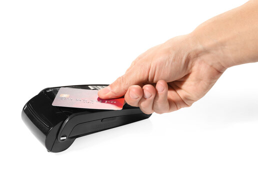 Man with credit card using payment terminal on white background, closeup