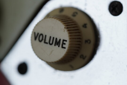 Close up macro shots of a guitar, focusing on something you wouldn't usually take notice of. 