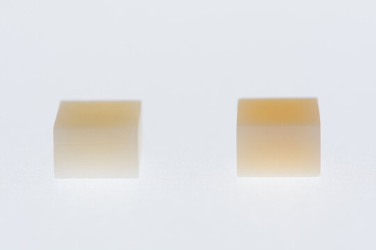 Comparison of emax and zirconia. Light transmission differences in dental materials after sintering.