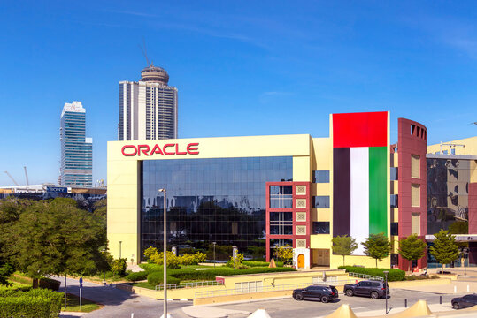Oracle office building in Dubai with huge UAE flag