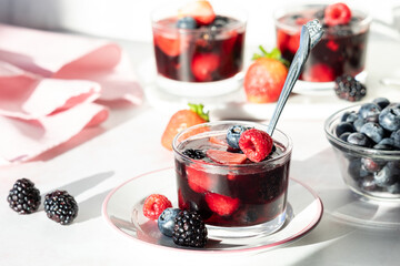 Fresh homemade mixed berry jelly cups ready for eating.