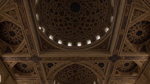 Slow cinematic push-in mosque coffered ceiling intricate geometric patterns Ramadan light
