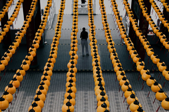 Symmetrical Perspective of Rows of Yellow Lanterns at Thean Hou Temple