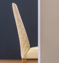 Naklejka premium Sleek side profile of upholstered chair in contemporary space