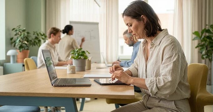 Modern office meeting collaboration and technology usage