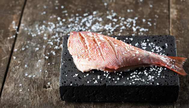 Red rockfish sprinkled with coarse salt