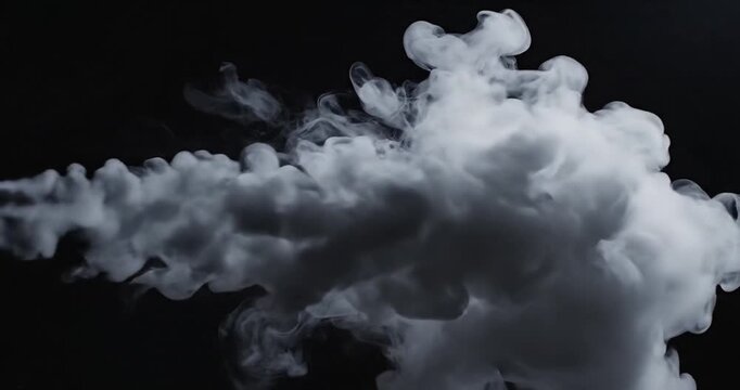 Smoke rising in the darkness.