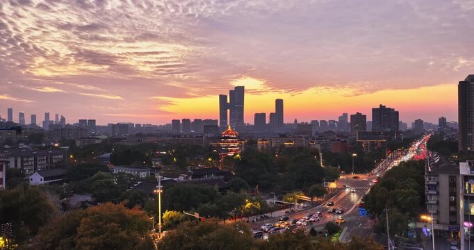 Traditional Chinese architecture and modern city sunset