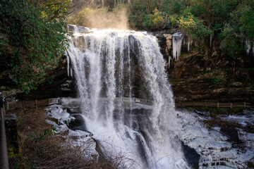 Large beautiful waterfall with icicles from the cold winter