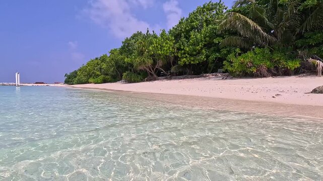 Ukulhas maldives bikini beach white sand remote exotic island palm trees