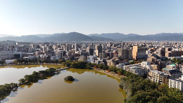Fukuoka City, Kyushu, Japan &ndash;Aerial Drone View of City Skyline, CBD, Ohori Park, Maizuru Park, Urban Lakes, Autumn Trees, Harbour, Port Area, Modern High-Rise Architecture, Houses and Apartments 