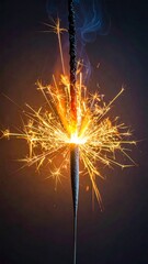 Glowing sparkler emits bright sparks against a blurred, dark background with wisps of smoke rising above it