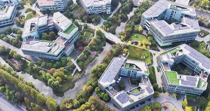 Aerial view of modern eco city with solar panels on roof