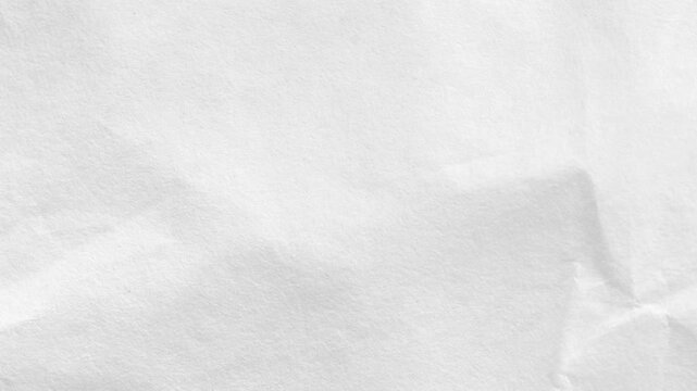 Abstract Crumpled Paper Transition,Animated stop motion of wrinkled white paper unfolding on a black background.Video stop motion 4k resolution