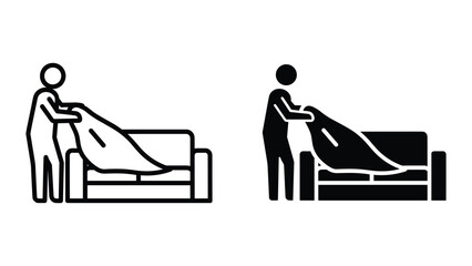 Making bed with clean sheets by person