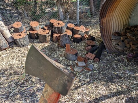 axe and wood pile