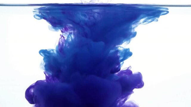 Liquid Ink Dynamics High-angle views of ink streams interacting and blending within a liquid medium, emphasizing the flow and unpredictable movement against a clean backdrop.