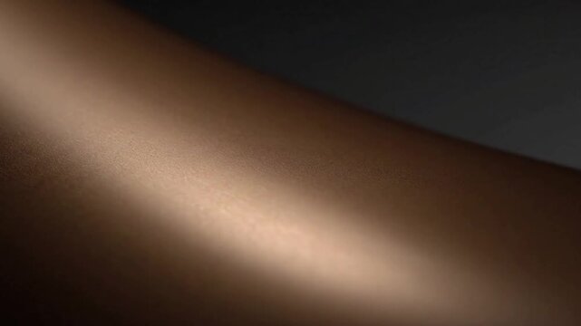 Industrial Detail Sweep Focus on a meticulously crafted burnished metal component, like a gridded surface or a joint, highlighting the 'subtle specular sweep' as light reveals its precision and