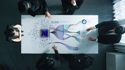 A group of diverse professionals engages collaboratively at a digital table, exploring artificial intelligence concepts and strategies to enhance business operations and efficiency. Trope © InfiniteFlow