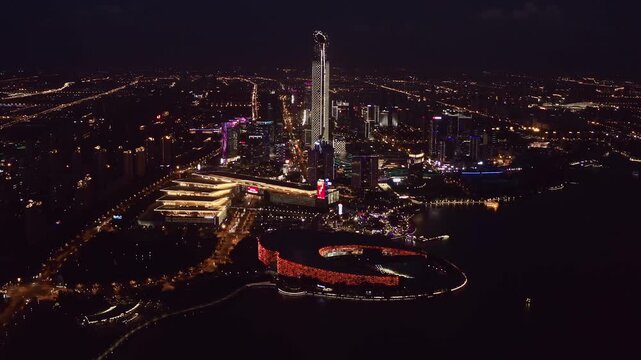 Aerial view of Suzhou industrial park skyline at night featuring Gate to the East and Jinji lake
