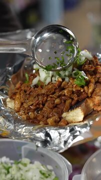 Fresh Finish: Slow Motion Cilantro and Onions on a Cheesy Torta