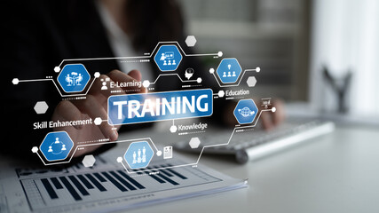 This image depicts a professional using digital tools to highlight training concepts, such as e-learning and skill enhancement, illustrating modern learning strategies. Tessel © InfiniteFlow