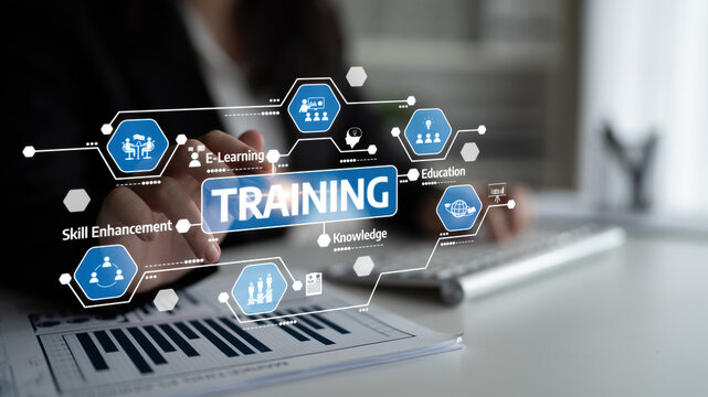 This image depicts a professional using digital tools to highlight training concepts, such as e-learning and skill enhancement, illustrating modern learning strategies. Tessel