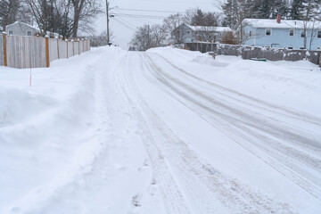 Obraz premium residential street after winter snow