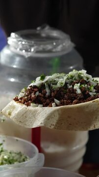 Fresh Finish: Slow Motion Onions and Cilantro on a Burrito