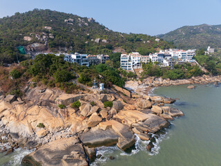 Aerial Drone View of Coastal Villas and Rocky Headland at the Southernmost Tip of Macau in Coloane
