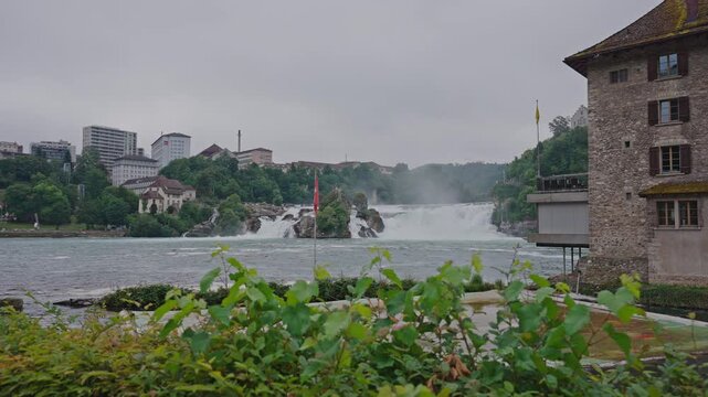 Rhine Falls and Historic Riverside Buildings in Switzerland.Filmed on 30 July 2025,
