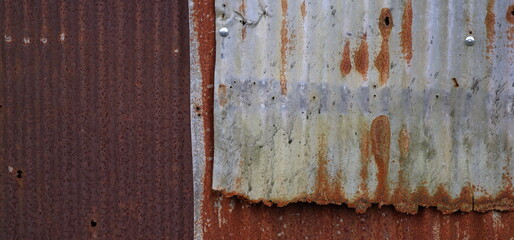 Old metal sheet roof texture. Pattern of old metal sheet. Rusty tin texture