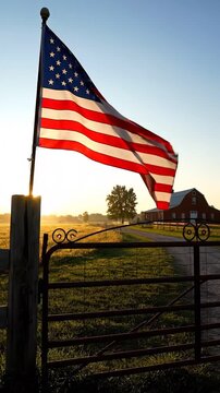 American flag waving in the breeze capturing patriotic moments during sunset on a rural property