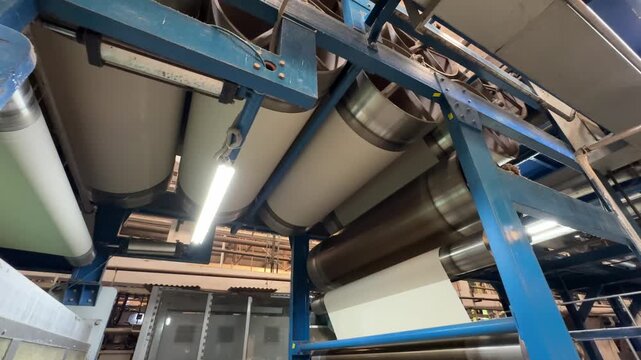 Textile mercerizing machine processing fabric in industrial factory