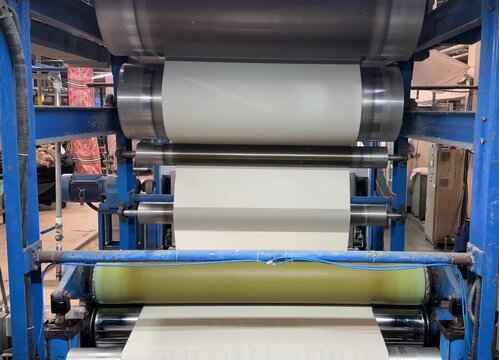 Textile mercerizing machine processing fabric in industrial factory