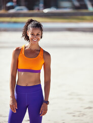 Fototapeta premium Fitness, happy or woman on sand with portrait, pride or progress in wellness hobby. Smile, space or African athlete outdoor with confidence, training break or workout results in body improvement.