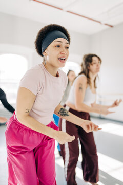Diverse group of women enjoying dance fitness class