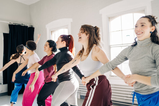Diverse women dancing together during a studio rehearsal