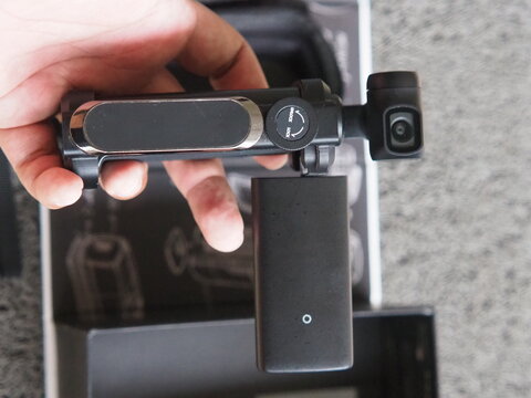 Compact Moza Moin pocket gimbal camera with modern stabilization technology, designed for smooth cinematic video recording, vlogging, travel content, and mobile filmmaking.