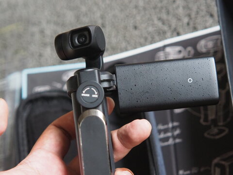 Compact Moza Moin pocket gimbal camera with modern stabilization technology, designed for smooth cinematic video recording, vlogging, travel content, and mobile filmmaking.